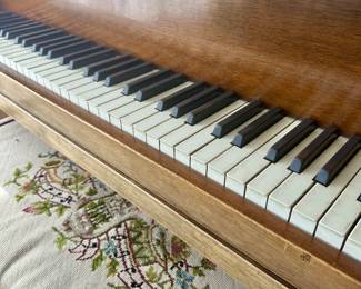 Vintage Wurlitzer baby grand piano.