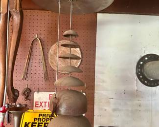 Hanging metal sculpture.