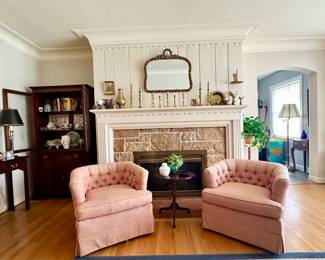 Vintage  tufted swivel club chairs.