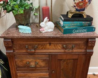 Brown Marble Top Wash Stand, lamp, books