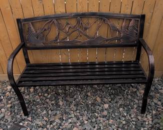 Metal Garden Bench with Mountain and Pine Tree Scene Backrest