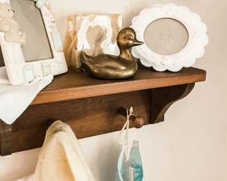 Baby Clothes, Brass Duck, Wooden Shelf