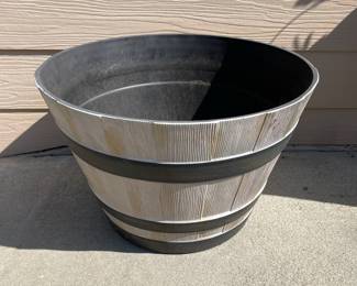 H35 - $15. Rubber Like Planter. 22" round x 14" tall. 