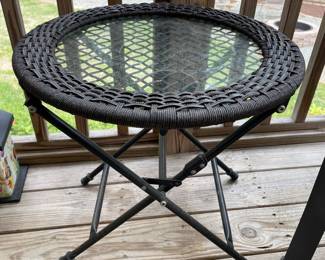 H106 - $25. Small Folding Round Outdoor Side Table. Measures 19.75" round x by 20" T. 