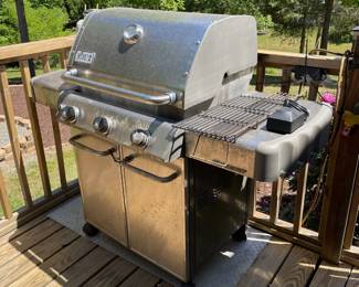 H9 - $125. Weber Genesis Grill includes propane tank. Measures 56 W by 26 D by 48 T 