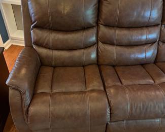 H103 - $650 Each. *2 Available* Ashley Brown Furniture Power Recline "Leather" Couches. Measures 84" W x 38" D x 41" T.  19.5 floor to seat height. Leather blend - it's 46% Leather, 37% PUC, 17% Polyester. Both are in very good condition. One has marks on the head rest (see photo)