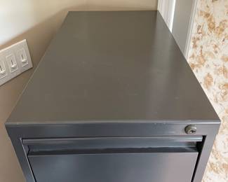 H38 - $20. Metal 4 Drawer Filing Cabinet. Measures 15 W by 27.75 W by 49.75 T 