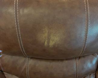 H103 - $650 Each. *2 Available* Ashley Brown Furniture Power Recline "Leather" Couches. Measures 84" W x 38" D x 41" T.  19.5 floor to seat height. Leather blend - it's 46% Leather, 37% PUC, 17% Polyester. Both are in very good condition. One has marks on the head rest (see photo)