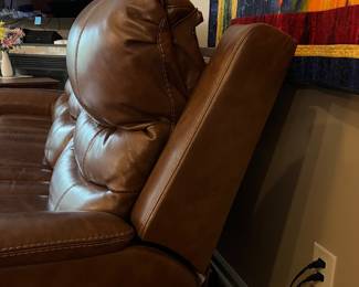 H103 - $650 Each. *2 Available* Ashley Brown Furniture Power Recline "Leather" Couches. Measures 84" W x 38" D x 41" T.  19.5 floor to seat height. Leather blend - it's 46% Leather, 37% PUC, 17% Polyester. Both are in very good condition. One has marks on the head rest (see photo)