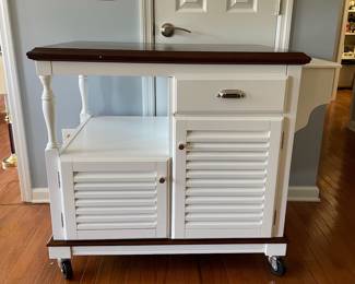 H1 - $125. Coaster Fine Furniture Rolling Cart. Measures 43 W x 24 D x 34.25 T. Larger than it looks! Very minor damage on one corner - otherwise in very good condition!