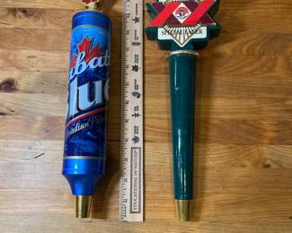 H84 - $90. Variety of Beer pull handles. Yuengling, Red Oak (has damage), Ginger's Revenge,  Bowling Pin, Modelo, Labatt Bleu, Dos Equis, Worsteiner. 