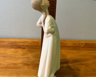 H85 - $25. Lladro #4872 Girl in Nightgown and #1014523 Girl w/ Slippers set. 