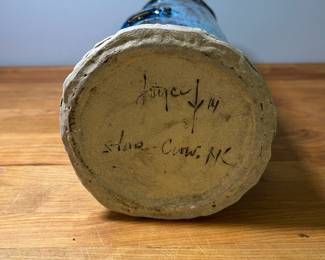 H91 - $30. Joyce Bryan signed Stone Crow NC. Drip Glaze Pottery Vase. Measures 12” Tall. 