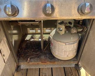 H9 - $125. Weber Genesis Grill includes propane tank. Measures 56 W by 26 D by 48 T 