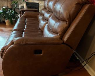 H103 - $650 Each. *2 Available* Ashley Brown Furniture Power Recline "Leather" Couches. Measures 84" W x 38" D x 41" T.  19.5 floor to seat height. Leather blend - it's 46% Leather, 37% PUC, 17% Polyester. Both are in very good condition. One has marks on the head rest (see photo)