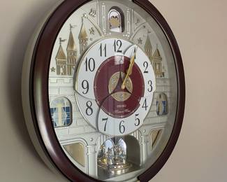 H20 - $125. Seiko “Melodies in Motion” Clock with Swarovski Crystals. Measures 15.5 W by 17 T 