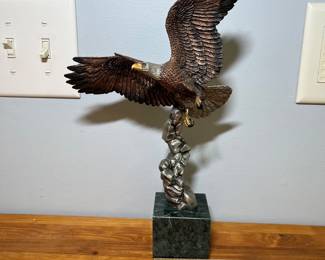 H54 - $200. Eagle Statue,  made in the USA. Legends, limited edition. On the back it is stamped K. Cantrell. "Spiral Flight" USA. 1993 Legend. Measures 12” Tall
