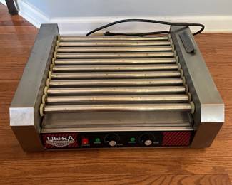 H17 - $100. Ultra Dawg Commercial Hot Dog Roller. Model 4094. 11 Rollers. Also has glass cover. 