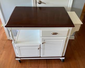 H1 - $125. Coaster Fine Furniture Rolling Cart. Measures 43 W x 24 D x 34.25 T. Larger than it looks! Very minor damage on one corner - otherwise in very good condition!