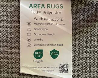 H13 - $75. Large Machine Washable Area Rug. Measures 106.5" x 142" (almost 9' x 12')