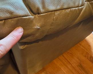 H4 - $60. Light Brown Leather Chair. Measures 35.5 Wide by 44 Deep by 42 Tall. Has wear on the handle, a hole under the right arm in the stitching and a tiny hole in the left arm - otherwise very comfy with lots of life left!