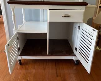 H1 - $125. Coaster Fine Furniture Rolling Cart. Measures 43 W x 24 D x 34.25 T. Larger than it looks! Very minor damage on one corner - otherwise in very good condition!