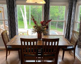 H104 - $450. Dining room Table set manufactured by Latitude Tree Furniture. Includes 4 chairs and bench set. Table Measures 77.5 W by 40 D by 30 T. Chairs measure at 19.5 W by 21 D by 40.25 T, Seat Height  is 18 T.  Bench measures 64 W by 16 D by 18 T.  Table top has some signs of wear and love but very sturdy and a great set!