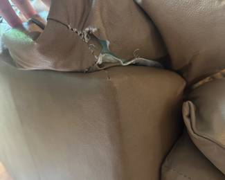H4 - $60. Light Brown Leather Chair. Measures 35.5 Wide by 44 Deep by 42 Tall. Has wear on the handle, a hole under the right arm in the stitching and a tiny hole in the left arm - otherwise very comfy with lots of life left!