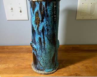 H91 - $30. Joyce Bryan signed Stone Crow NC. Drip Glaze Pottery Vase. Measures 12” Tall. 