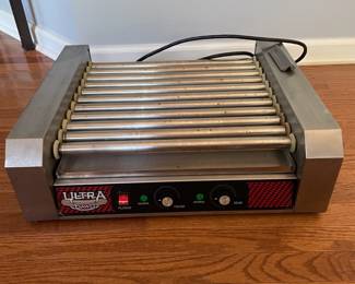 H17 - $100. Ultra Dawg Commercial Hot Dog Roller. Model 4094. 11 Rollers. Also has glass cover. 