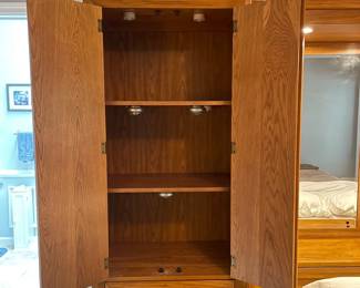 H7 - $350. Thomasville Wood Bed Frame with Mirrored Back. Measures 108.25 W by 18 D by 78 T. 