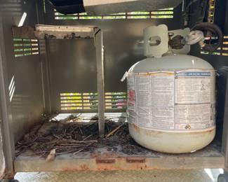 H9 - $125. Weber Genesis Grill includes propane tank. Measures 56 W by 26 D by 48 T 