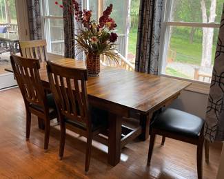 H104 - $450. Dining room Table set manufactured by Latitude Tree Furniture. Includes 4 chairs and bench set. Table Measures 77.5 W by 40 D by 30 T. Chairs measure at 19.5 W by 21 D by 40.25 T, Seat Height  is 18 T.  Bench measures 64 W by 16 D by 18 T.  Table top has some signs of wear and love but very sturdy and a great set!