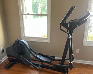 H18 - $1,700. Life Fitness x3i Elliptical Cross-Trainer. 80" long  x 62" tall. 