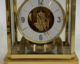Lot 140	LE COULTRE (Swiss, Jaeger-LeCoultre), Atmos Perpetual Clock, gold plated brass and glass, calibre 528, mid 20th century