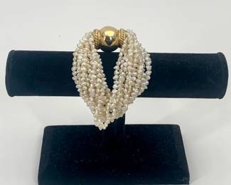 Lot 163	Vintage Estate 14 Karat Yellow Gold Natural Seed Pearl Multi Strand Torsade Bracelet With Domed Gold Ball Clasp