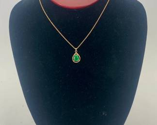 Lot 164	Pear-Shaped Green Jadeite Pendant in 14K Gold with Chain
