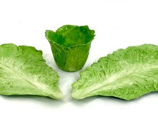 Lot 66	Marky Kirk Kelly (American, 1918-2013). Two Porcelain Cabbage Leaf Plates and One Cup (c. 1980s).