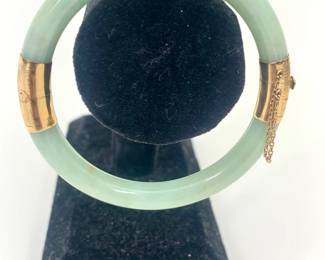 Lot 165	Translucent Jadeite Bangle Bracelet with 14K Gold Fittings