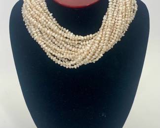 Lot 162	Vintage Estate 14 Karat Yellow Gold Natural Seed Pearl Multi Strand Torsade Necklace With Domed Gold Ball Clasp