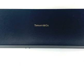 Lot 26	Two Sterling Silver Tiffany & Co. Lotus Cake Serving Set in Velvet Lined Blue Tiffany & Co Leather Box (20th century). Sterling Silver.