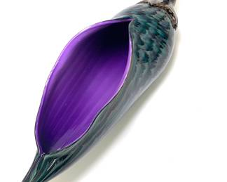Lot 150	JOHN LEIGHTON (American 1948-2018), Bird Form Vessel, hand blown studio glass with teal feather pattern exterior and amethyst purple interior, signed