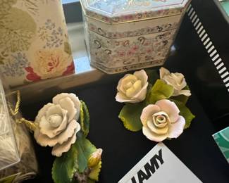 Vintage Porcelain Rose Figurines with Decorative Octagonal Tin