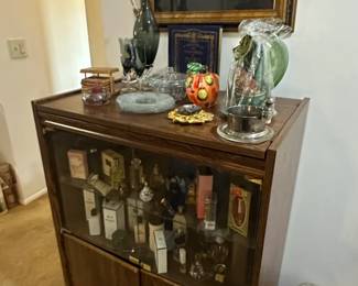 Vintage MidCentury Modern Display Cabinet with Assorted Perfume Bottles