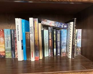 Oak Bookshelf with Assorted Books and Artwork fifth image