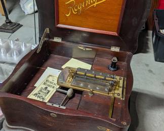 Antique music box, lots of discs