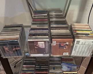 HP Color LaserJet Pro Mdw Printer with Assorted CDs and Media Shelf second image