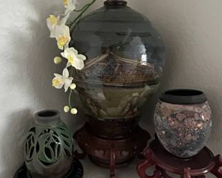 Collection of Decorative Ceramic Vases with Wooden Stands