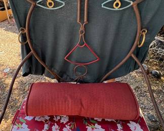 Metal woman face chair