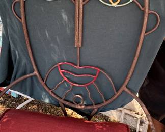 Metal man face chair